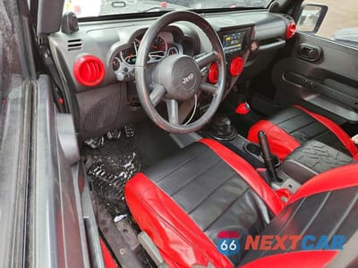 Zdjęcie 8 z 12 samochodu: 2007 JEEP WRANGLER SAHARA VIN:1J4FA54107L228512 - miniatura