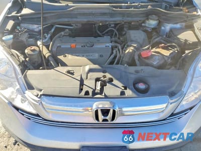 Zdjęcie 12 z 13 samochodu: 2009 HONDA CR-V EX VIN:3CZRE48509G704363 - miniatura