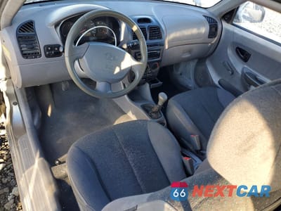 Zdjęcie 8 z 12 samochodu: 2003 HYUNDAI ACCENT BASE VIN:KMHCF35C63U271055 - miniatura