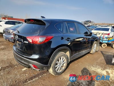 Trzecie zdjęcie samochodu z tyłu: 2014 MAZDA CX-5 TOURING VIN:JM3KE4CY0E0419404 - miniatura