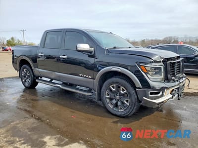 Czwarte zdjęcie samochodu z boku: 2021 NISSAN TITAN PLATINUM RESERVE VIN:1N6AA1ED4MN536264 - miniatura