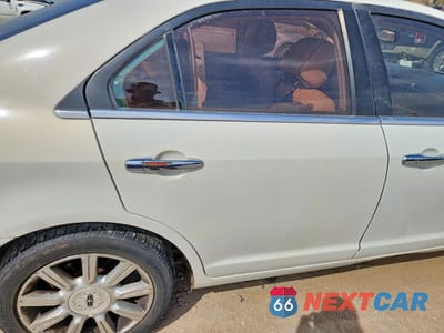 Zdjęcie 10 z 12 samochodu: 2012 LINCOLN MKZ VIN:3LNHL2GC1CR801980 - miniatura