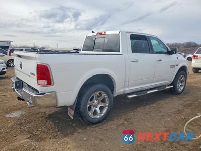 Trzecie zdjęcie samochodu z tyłu: 2016 RAM 1500 LARAMIE VIN:1C6RR7NT9GS153037 - miniatura