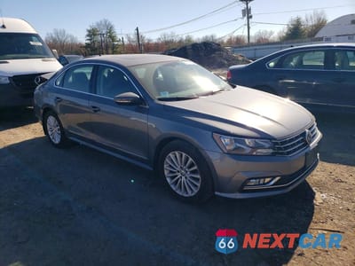 Czwarte zdjęcie samochodu z boku: 2016 VOLKSWAGEN PASSAT SE VIN:1VWBT7A39GC067395 - miniatura