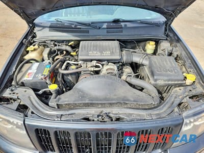 Zdjęcie 12 z 13 samochodu: 2000 JEEP GRAND CHEROKEE LIMITED VIN:1J4GW58N0YC227221 - miniatura