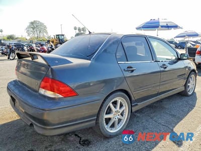 Trzecie zdjęcie samochodu z tyłu: 2002 MITSUBISHI LANCER OZ RALLY VIN:JA3AJ86E52U066279 - miniatura