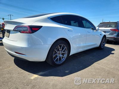 Trzecie zdjęcie samochodu z tyłu: 2019 TESLA MODEL 3 VIN:5YJ3E1EA7KF464543 - miniatura