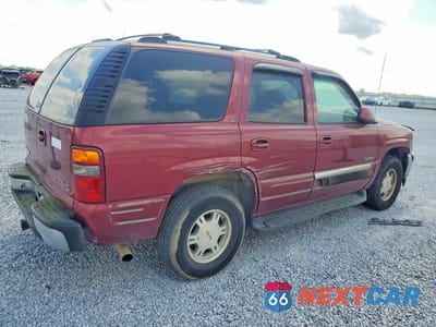 Trzecie zdjęcie samochodu z tyłu: 2001 GMC YUKON VIN:1GKEC13T21J252292 - miniatura