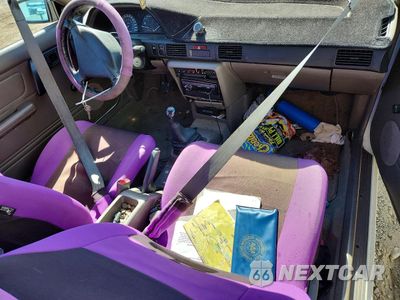 Zdjęcie 8 z 13 samochodu: 1992 MAZDA 323 BASE VIN:JM1BG2329N0473691 - miniatura