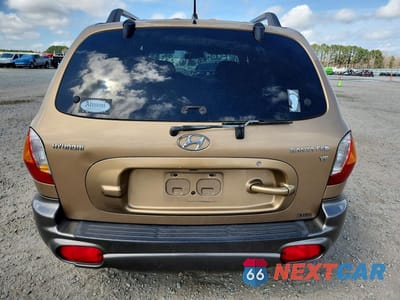 Zdjęcie 6 z 14 samochodu: 2004 HYUNDAI SANTA FE GLS VIN:KM8SC13D04U766891 - miniatura