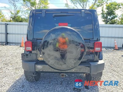 Zdjęcie 6 z 13 samochodu: 2014 JEEP WRANGLER UNLIMITED SAHARA VIN:1C4HJWEG7EL166515 - miniatura