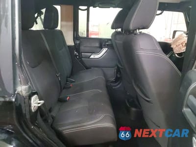 Zdjęcie 10 z 11 samochodu: 2013 JEEP WRANGLER UNLIMITED SAHARA VIN:1C4BJWEG8DL509580 - miniatura