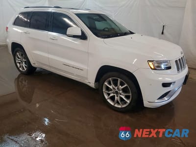 Czwarte zdjęcie samochodu z boku: 2015 JEEP GRAND CHEROKEE SUMMIT VIN:1C4RJEJG9FC749884 - miniatura