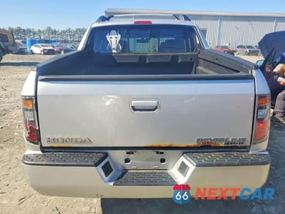 Zdjęcie 6 z 12 samochodu: 2006 HONDA RIDGELINE RTL VIN:2HJYK16566H557632 - miniatura