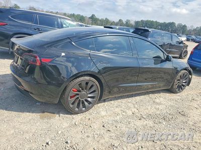 Trzecie zdjęcie samochodu z tyłu: 2023 TESLA MODEL 3 VIN:5YJ3E1EC5PF667357 - miniatura