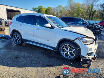 Czwarte zdjęcie samochodu z boku: 2017 BMW X1 SDRIVE28I VIN:WBXHU7C30H5H35670 - miniatura