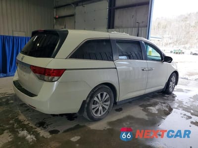 Trzecie zdjęcie samochodu z tyłu: 2016 HONDA ODYSSEY EXL VIN:5FNRL5H67GB057604 - miniatura