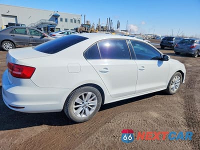 Trzecie zdjęcie samochodu z tyłu: 2015 VOLKSWAGEN JETTA BASE VIN:3VW1K7AJ9FM267560 - miniatura
