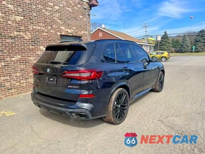 Trzecie zdjęcie samochodu z tyłu: 2022 BMW X5 M50I VIN:5UXJU4C07N9K43432 - miniatura