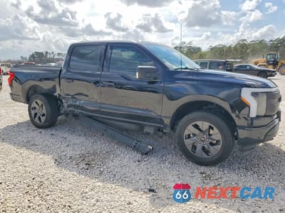 Czwarte zdjęcie samochodu z boku: 2024 FORD F150 LIGHTNING XLT VIN:1FTVW3L70RWG16970 - miniatura