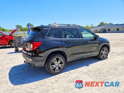 Trzecie zdjęcie samochodu z tyłu: 2019 HONDA PASSPORT EXL VIN:5FNYF8H51KB010590 - miniatura