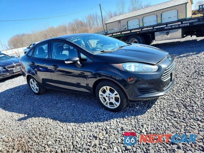 Czwarte zdjęcie samochodu z boku: 2014 FORD FIESTA SE VIN:3FADP4BJ9EM145042 - miniatura