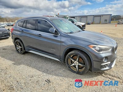 Czwarte zdjęcie samochodu z boku: 2016 BMW X1 XDRIVE28I VIN:WBXHT3C35G5E55639 - miniatura