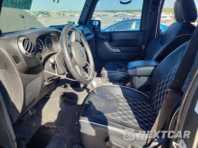 Zdjęcie 7 z 12 samochodu: 2013 JEEP WRANGLER UNLIMITED SPORT VIN:1C4BJWDG1DL659144 - miniatura