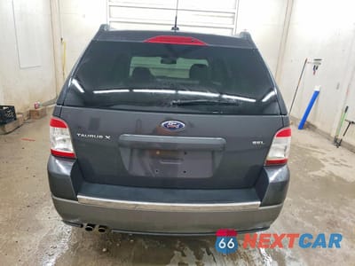Zdjęcie 6 z 13 samochodu: 2008 FORD TAURUS X SEL VIN:1FMDK02WX8GA10501 - miniatura