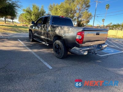 Trzecie zdjęcie samochodu z tyłu: 2014 TOYOTA TUNDRA DOUBLE CAB SR VIN:5TFRM5F10EX076695 - miniatura