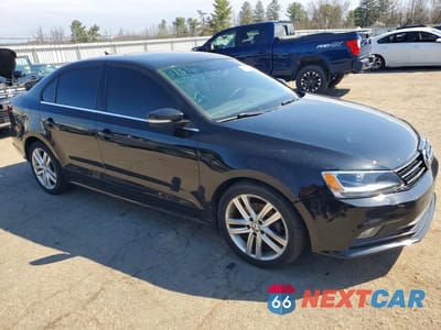 Czwarte zdjęcie samochodu z boku: 2015 VOLKSWAGEN JETTA TDI VIN:3VWLA7AJ7FM235265 - miniatura