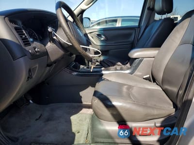 Zdjęcie 7 z 13 samochodu: 2005 MAZDA TRIBUTE S VIN:4F2CZ06175KM49674 - miniatura