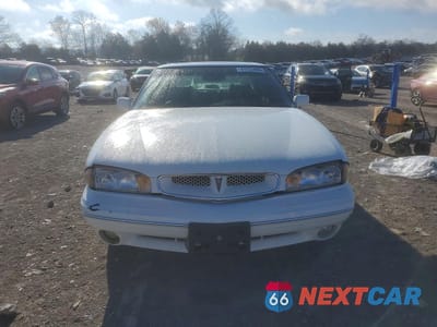 Piąte zdjęcie samochodu w środku: 1999 PONTIAC BONNEVILLE SE VIN:1G2HX52K2XH233680 - miniatura