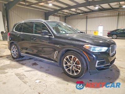 Czwarte zdjęcie samochodu z boku: 2022 BMW X5 XDRIVE45E VIN:5UXTA6C00N9K05232 - miniatura