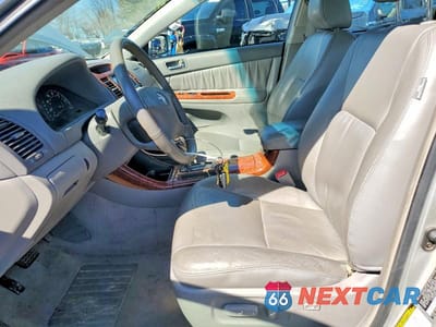 Zdjęcie 7 z 11 samochodu: 2004 TOYOTA CAMRY XLE VIN:4T1BE30K94U315287 - miniatura