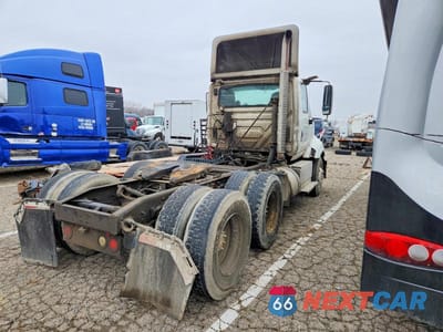 Czwarte zdjęcie samochodu z boku: 2015 INTERNATIONAL PROSTAR SEMI TRUCK VIN:3HSDJAPRXFN120601 - miniatura