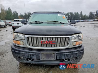 Piąte zdjęcie samochodu w środku: 2006 GMC YUKON DENALI VIN:1GKEK63UX6J134734 - miniatura