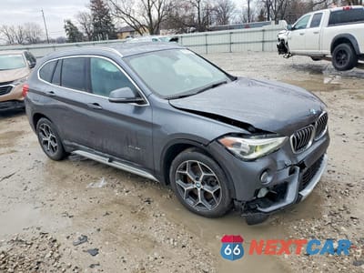 Czwarte zdjęcie samochodu z boku: 2017 BMW X1 XDRIVE28I VIN:WBXHT3C34H5F85185 - miniatura