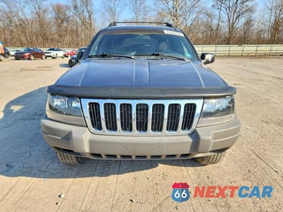 Piąte zdjęcie samochodu w środku: 2001 JEEP GRAND CHEROKEE LAREDO VIN:1J4GW48S31C518480 - miniatura