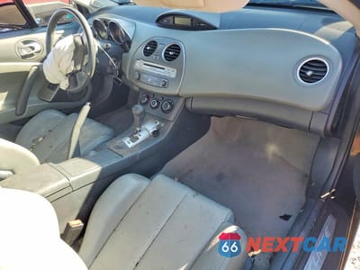 Zdjęcie 8 z 11 samochodu: 2012 MITSUBISHI ECLIPSE GS SPORT VIN:4A31K5DF4CE008116 - miniatura