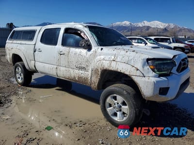 Czwarte zdjęcie samochodu z boku: 2013 TOYOTA TACOMA V6 VIN:3TMMU4FN4DM059667 - miniatura