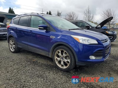 Czwarte zdjęcie samochodu z boku: 2016 FORD ESCAPE TITANIUM VIN:1FMCU0J9XGUB73280 - miniatura