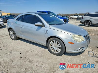 Czwarte zdjęcie samochodu z boku: 2011 VOLKSWAGEN EOS KOMFORT VIN:WVWAA7AH6BV000234 - miniatura