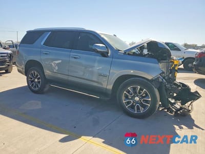 Czwarte zdjęcie samochodu z boku: 2023 CHEVROLET TAHOE C1500 LT VIN:1GNSCNKD0PR513808 - miniatura