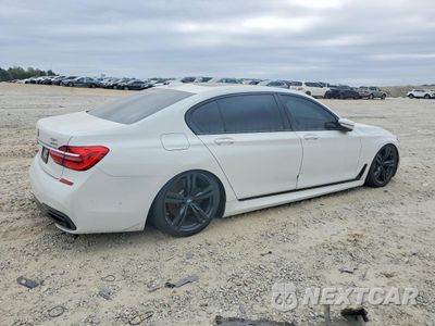 Trzecie zdjęcie samochodu z tyłu: 2016 BMW 740 I VIN:WBA7E2C53GG504561 - miniatura
