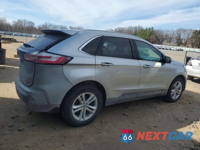Trzecie zdjęcie samochodu z tyłu: 2020 FORD EDGE SEL VIN:2FMPK4J93LBA57997 - miniatura
