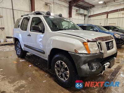 Czwarte zdjęcie samochodu z boku: 2014 NISSAN XTERRA PRO-4X VIN:5N1AN0NW9EN808954 - miniatura