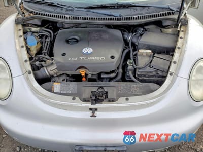 Zdjęcie 11 z 12 samochodu: 2001 VOLKSWAGEN NEW BEETLE GLS VIN:3VWCD21C91M418767 - miniatura