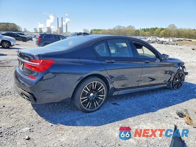 Trzecie zdjęcie samochodu z tyłu: 2016 BMW 750 XI VIN:WBA7B0C54GG526890 - miniatura