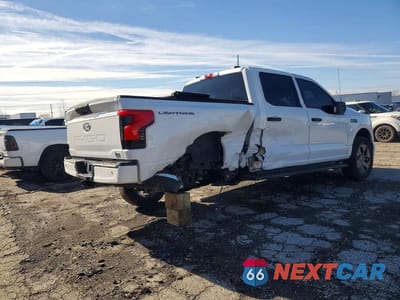 Trzecie zdjęcie samochodu z tyłu: 2024 FORD F150 LIGHTNING XLT VIN:1FTVW3LK9RWG29110 - miniatura
